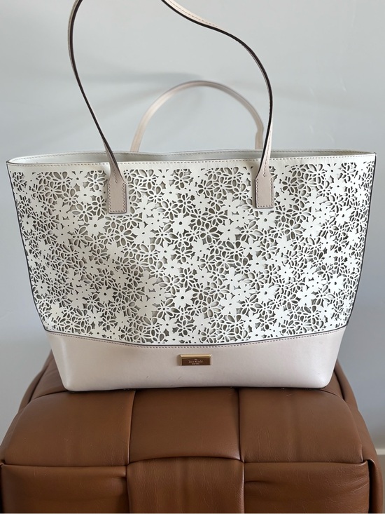 kate spade Handbags - kate spade Cream Laser-Cut Floral Tote with Pale Pink Trim